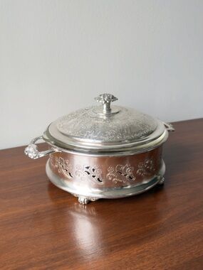 silver plate covered dish with glass insert.